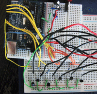 Using an Arduino microcontroller's 6 pulse width modulation channels to drive vibration motors (October 2008). Photo by Jon Bird.